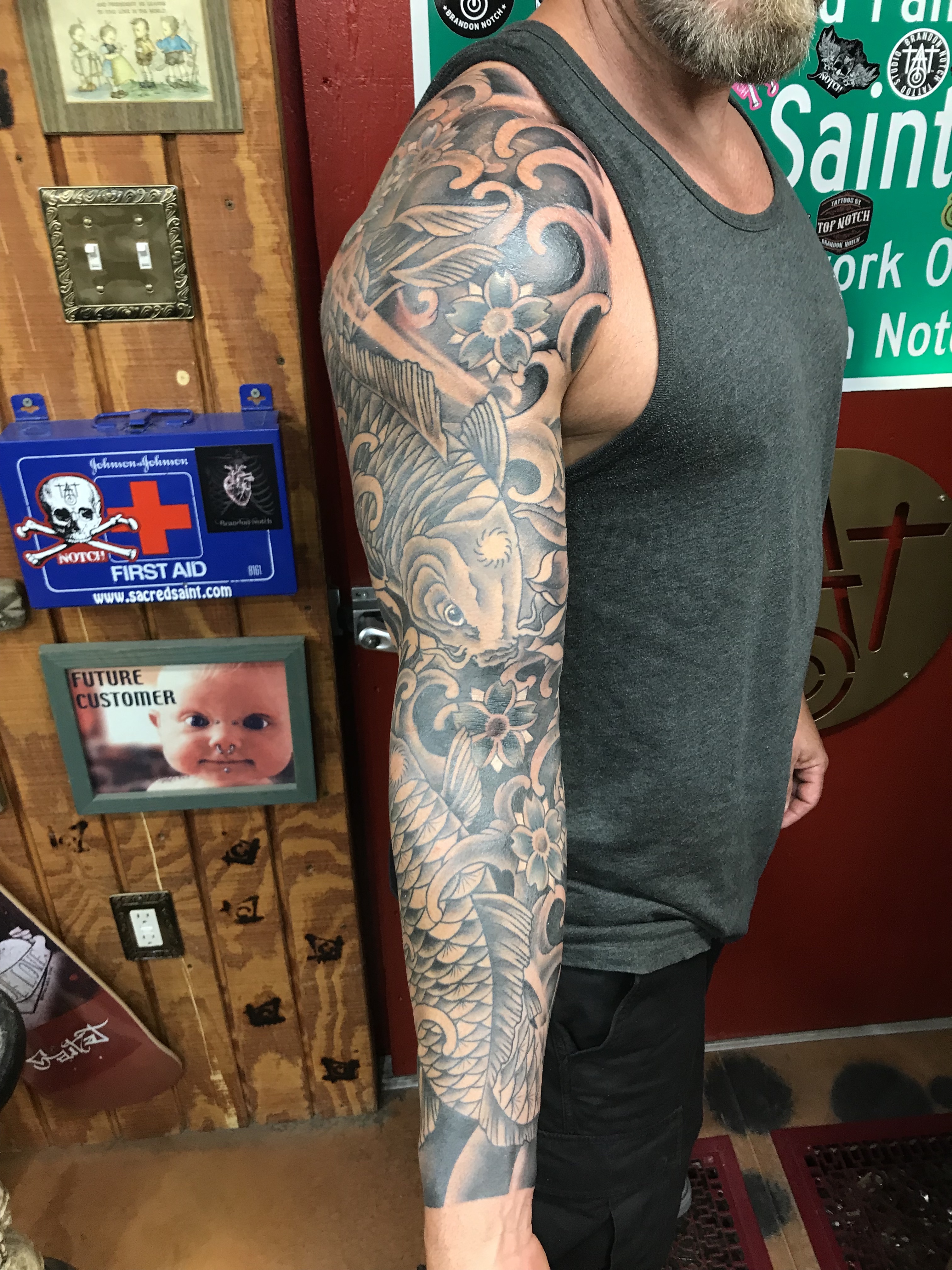  Koi fish and Cherry blossoms in water tattoo sleeve  