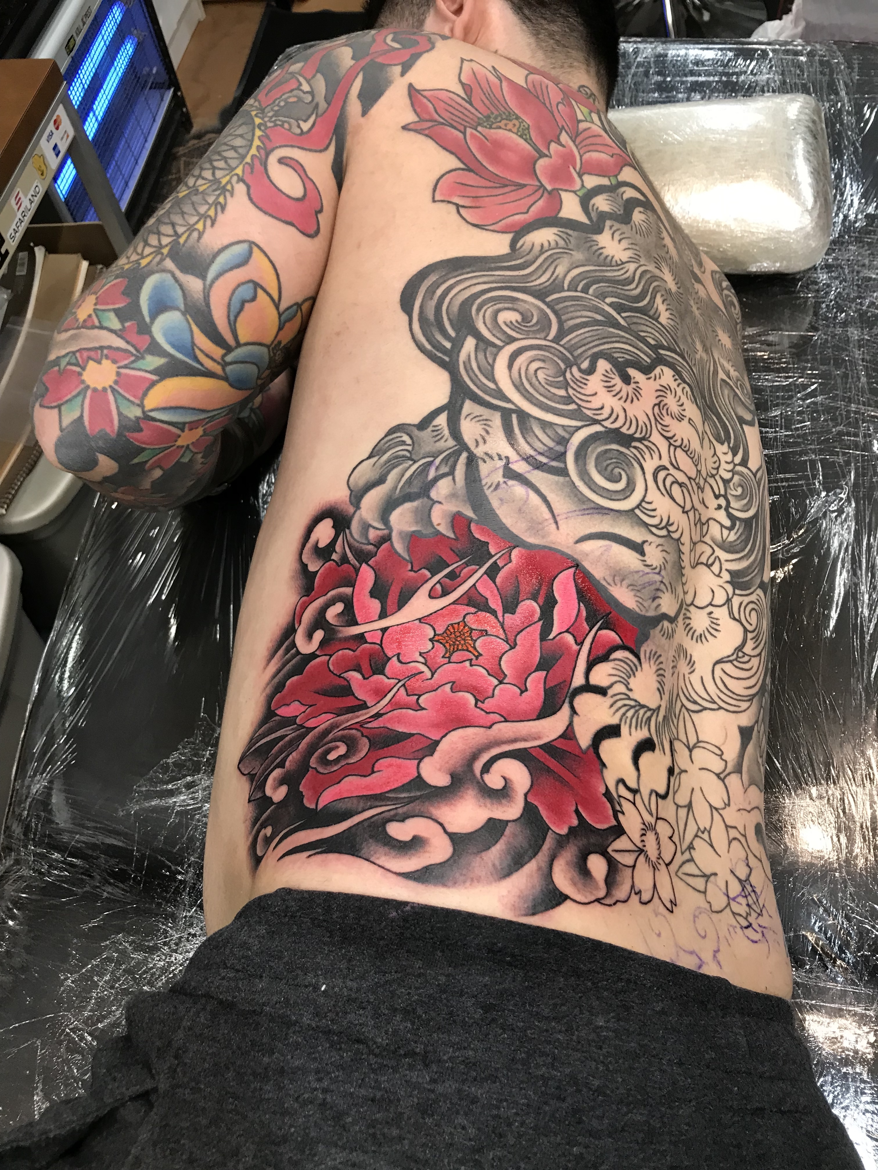  Guardian lion, komainu, shishi, foo dog and flowers backpiece tattoo 